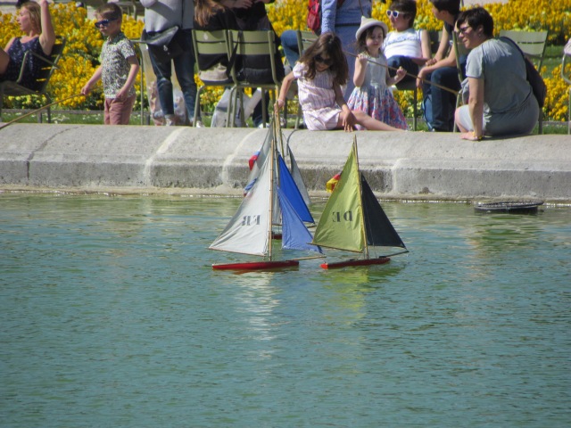 The circular basin in front of the palace is where local children bring their model sailboats and visitors can rent them at a nearby kiosk. Children are given long sticks so when their boat approaches the edge, they can push it off with their stick and it sails away again.